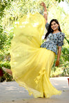 Yellow Chinnon With Position Print Blouse With Plain Tebby Silk Lehenga