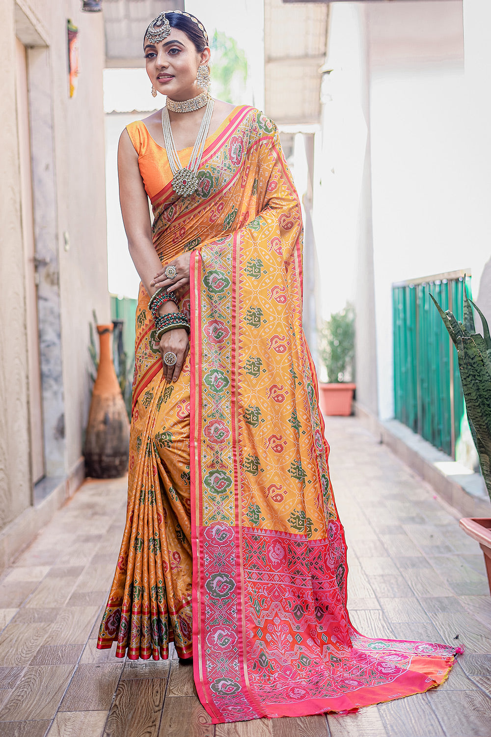 Pastel Orange Patola Silk Saree With Weaving Work