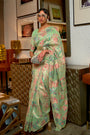 Pista Green Soft Silk Saree With Floral Weaving Pattern
