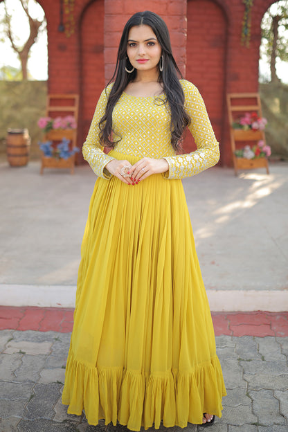 Latest Yellow Faux Blooming Zari Embroidered Work Gown