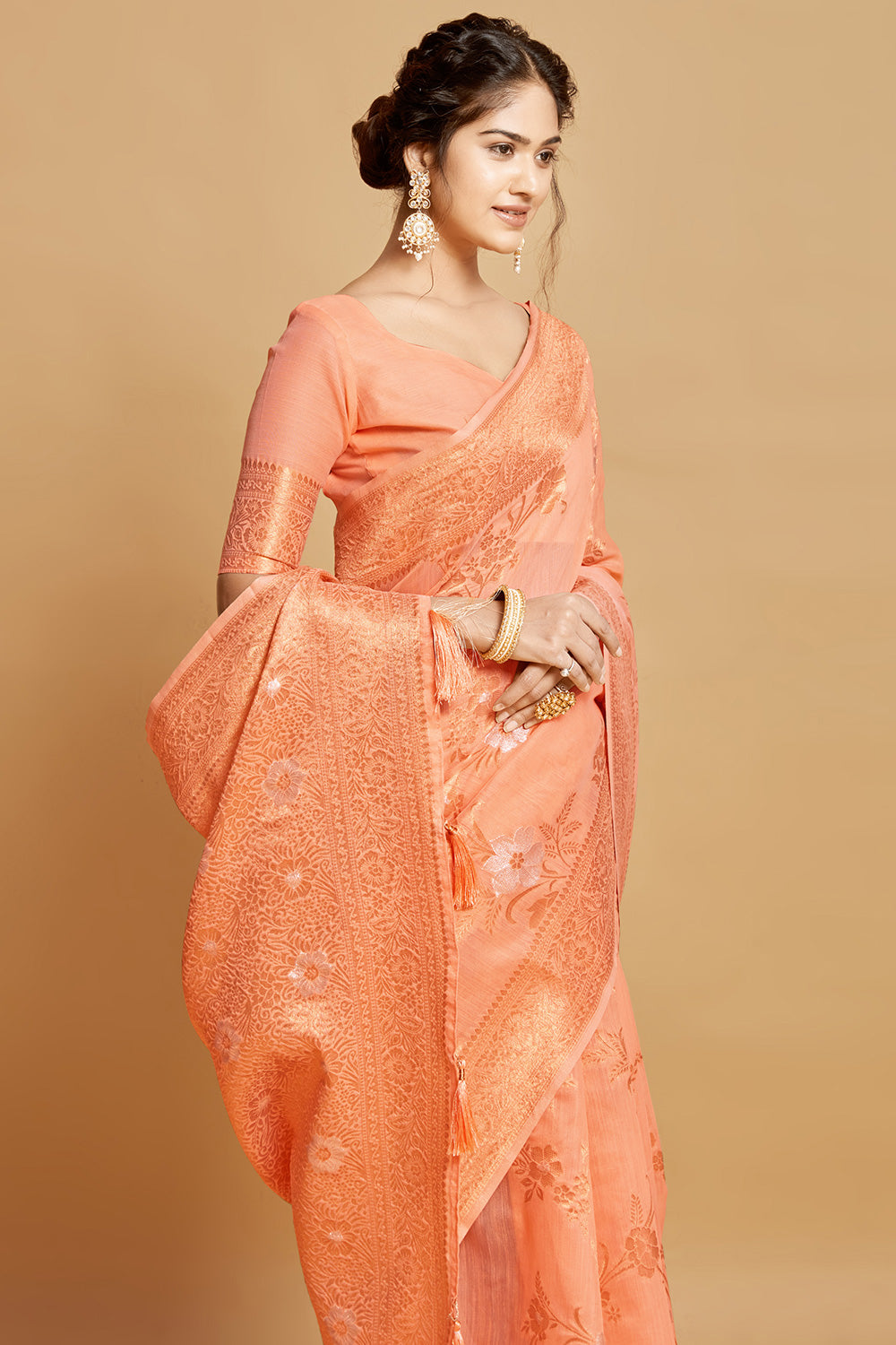 Creamy Peach Linen Saree With Zari Weaving Work