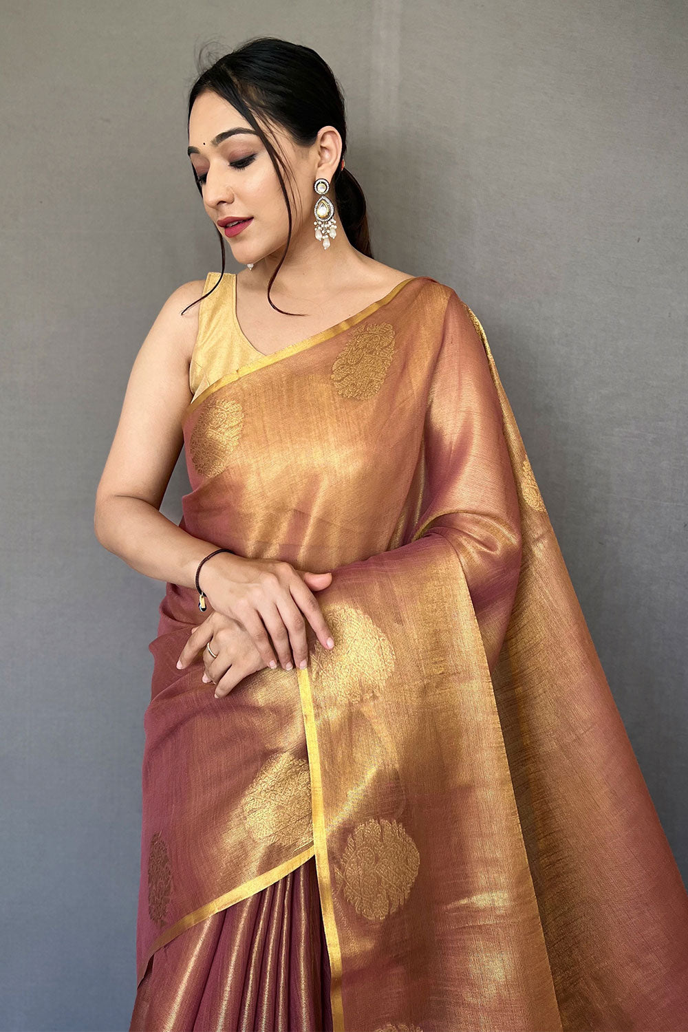 Light Brown Tissue Silk Saree With Zari Weaving Work