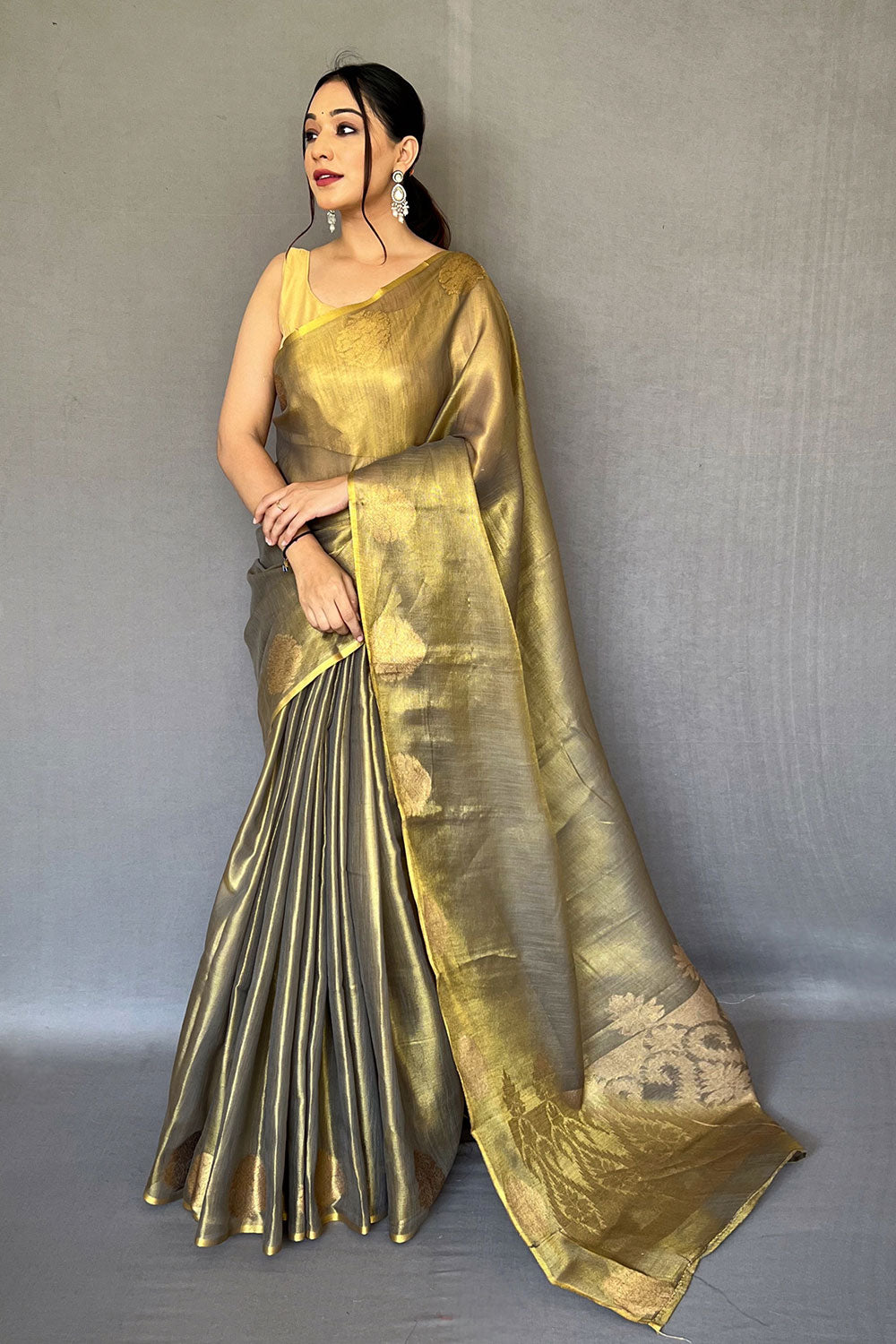 Mehendi Green Tissue Silk Saree With Zari Weaving Work