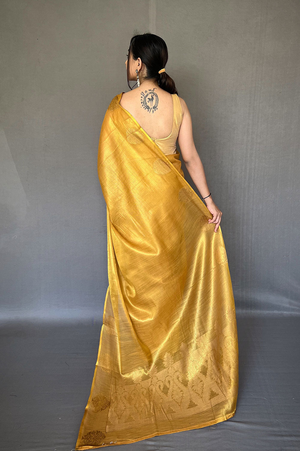 Mustard Yellow Tissue Silk Saree With Zari Weaving Work