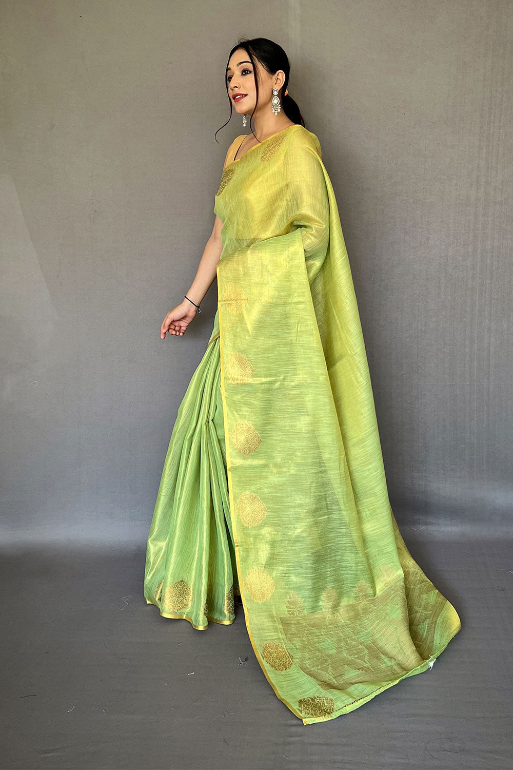 Pista Green Tissue Silk Saree With Zari Weaving Work