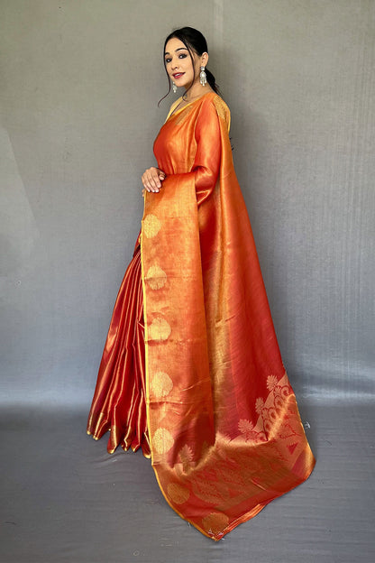 Light Orange Tissue Silk Saree With Zari Weaving Work