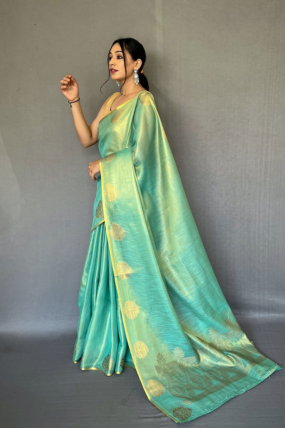 Sea Green Tissue Silk Saree With Zari Weaving Work