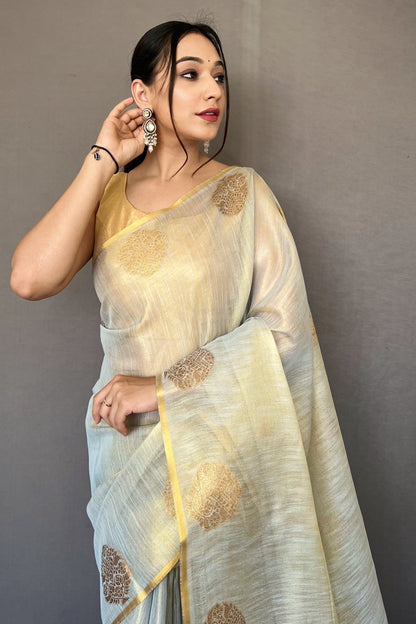Off White Tissue Silk Saree With Zari Weaving Work