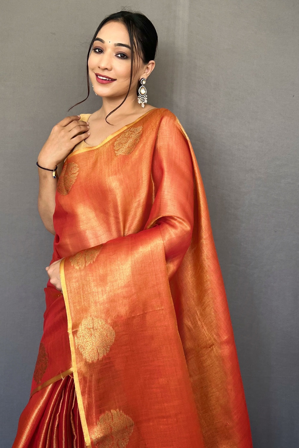 Orange Tissue Silk Saree With Zari Weaving Work