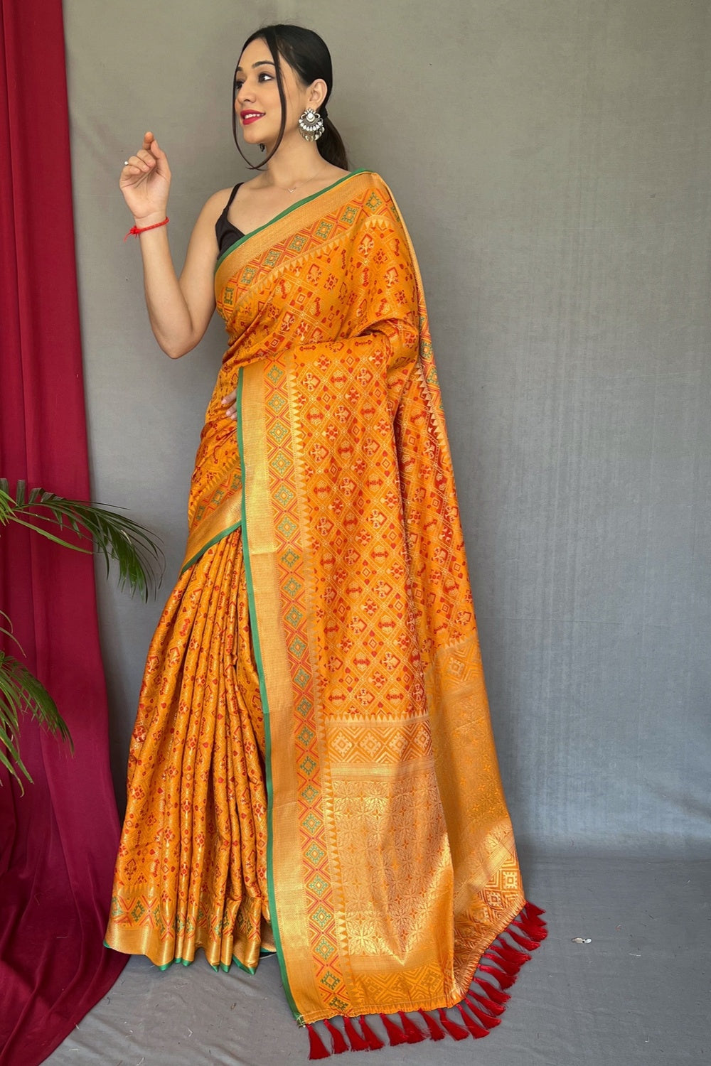 Yellow Patola Silk Saree With Zari Weaving Work