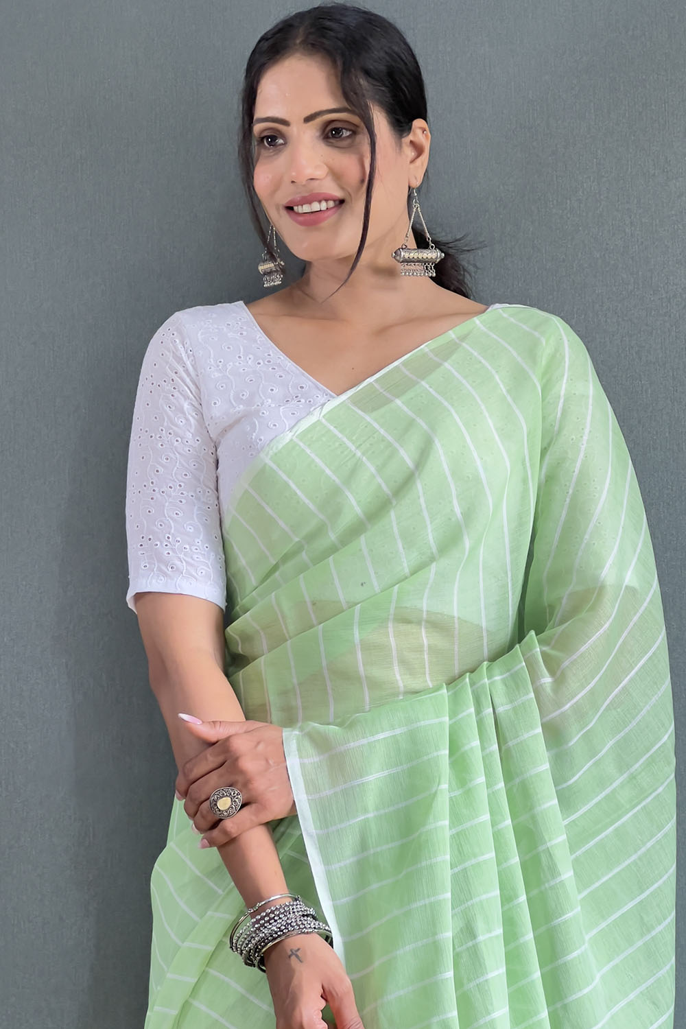 Green Cotton Striped Saree With Tassels On Pallu