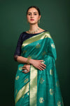 Rama Green Tussar Silk Saree With Zari Weaving Work