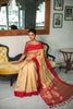 Cream Semi Tussar Silk With Ikkat Weaves Checks Fancy Tassels Saree