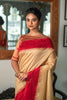 Cream Semi Tussar Silk With Ikkat Weaves Checks Fancy Tassels Saree