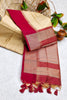 Cream Semi Tussar Silk With Ikkat Weaves Checks Fancy Tassels Saree