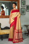 Cream Semi Tussar Silk With Ikkat Weaves Checks Fancy Tassels Saree