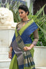 Olive Green Semi Tussar Silk With Ikkat Weaves Checks Fancy Tassels Saree