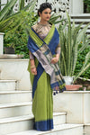Olive Green Semi Tussar Silk With Ikkat Weaves Checks Fancy Tassels Saree