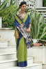 Olive Green Semi Tussar Silk With Ikkat Weaves Checks Fancy Tassels Saree