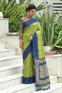 Olive Green Semi Tussar Silk With Ikkat Weaves Checks Fancy Tassels Saree