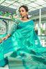 Teal Green Semi Tussar Silk With Ikkat Weaves Checks Fancy Tassels Saree