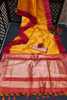 Yellow Semi Tussar Silk With Ikkat Weaves Checks Fancy Tassels Saree