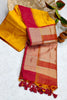 Yellow Semi Tussar Silk With Ikkat Weaves Checks Fancy Tassels Saree