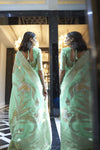 Tea Green Zari Woven Linen Silk Saree With Matching Blouse