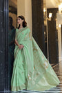Tea Green Zari Woven Linen Silk Saree With Matching Blouse