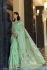 Tea Green Zari Woven Linen Silk Saree With Matching Blouse
