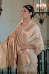 Beige color Handloom Zari Weaving Silk Saree With Woven Border