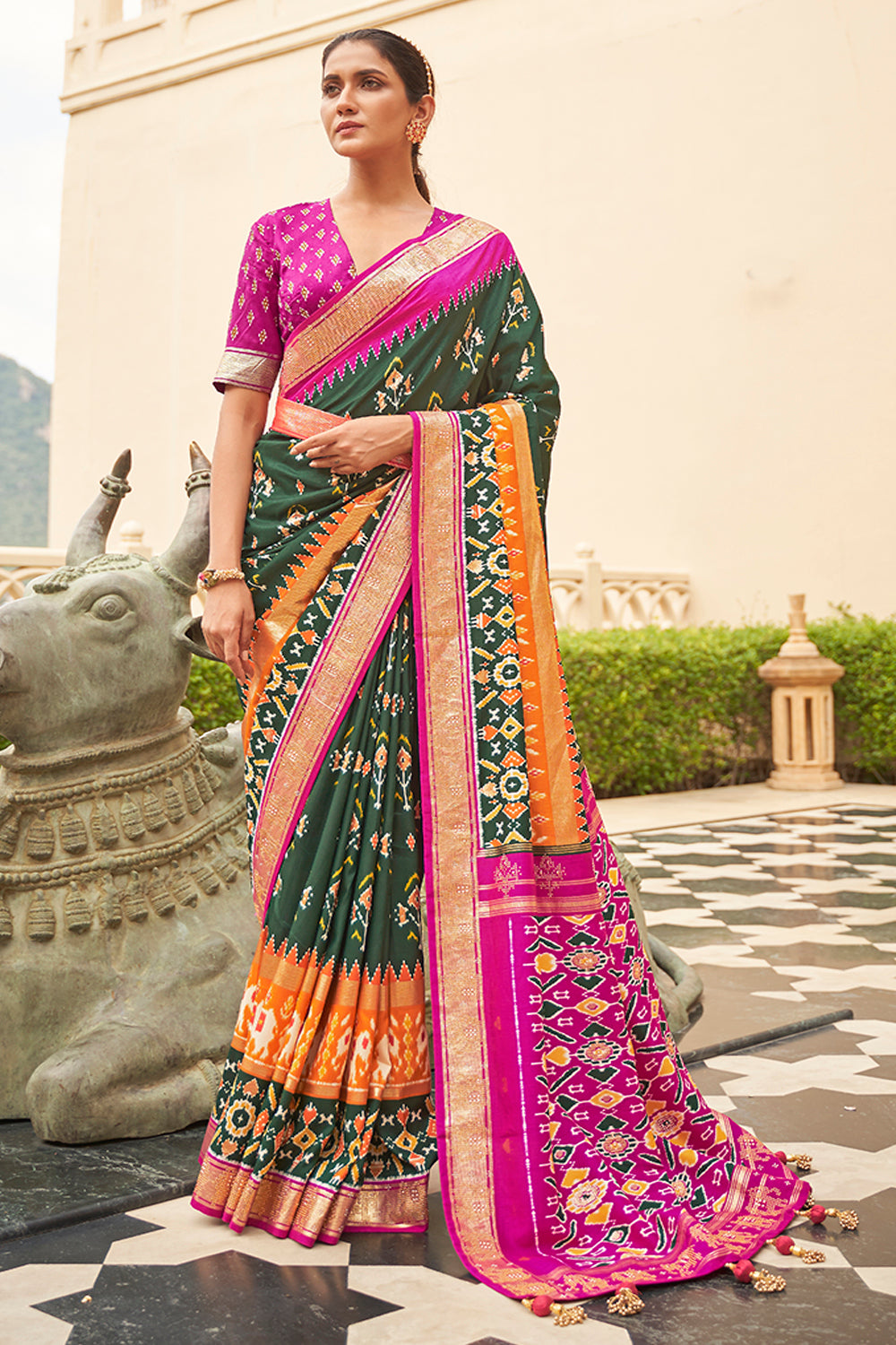 Alluring Green And Pink Patola Silk Saree