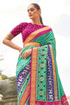 Alluring Green And Pink Patola Silk Saree
