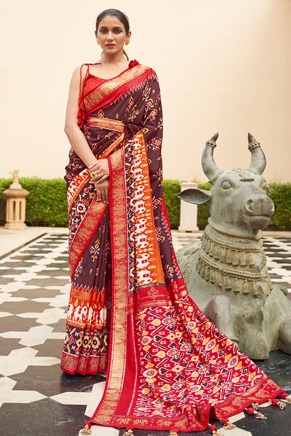 Alluring Brown And Red Patola Silk Saree