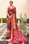 Alluring Brown And Orange Patola Silk Saree