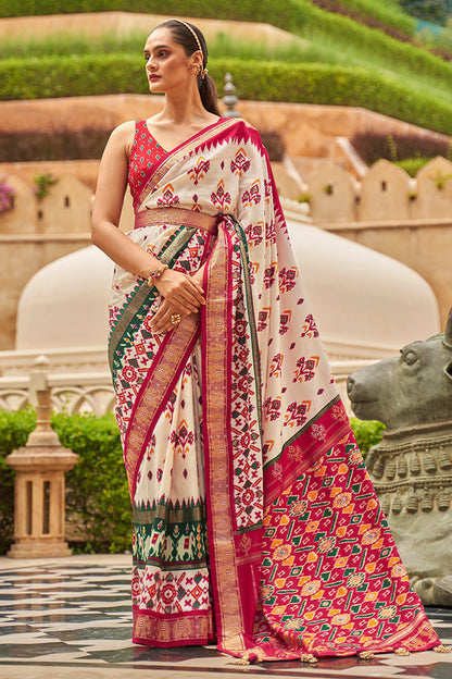 Alluring Off-white And Red Patola Silk Saree