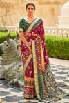 Alluring Maroon And Green Patola Silk Saree With Weaving