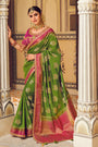 Alluring Green Banarasi Silk Saree With Designer Blouse