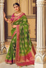 Alluring Green Banarasi Silk Saree With Designer Blouse