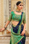 Fascinating Navy Blue Banarasi Silk Saree With Designer Blouse