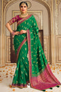 Alluring Emerald Green Banarasi Silk Saree With Designer Blouse