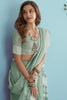 Sea Green Soft Linen Saree With Chikankari Weaved Border