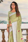 Pista shade Soft Linen with Lucknowi weaving Border and Gota patti work