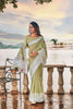 Pista shade Soft Linen with Lucknowi weaving Border and Gota patti work