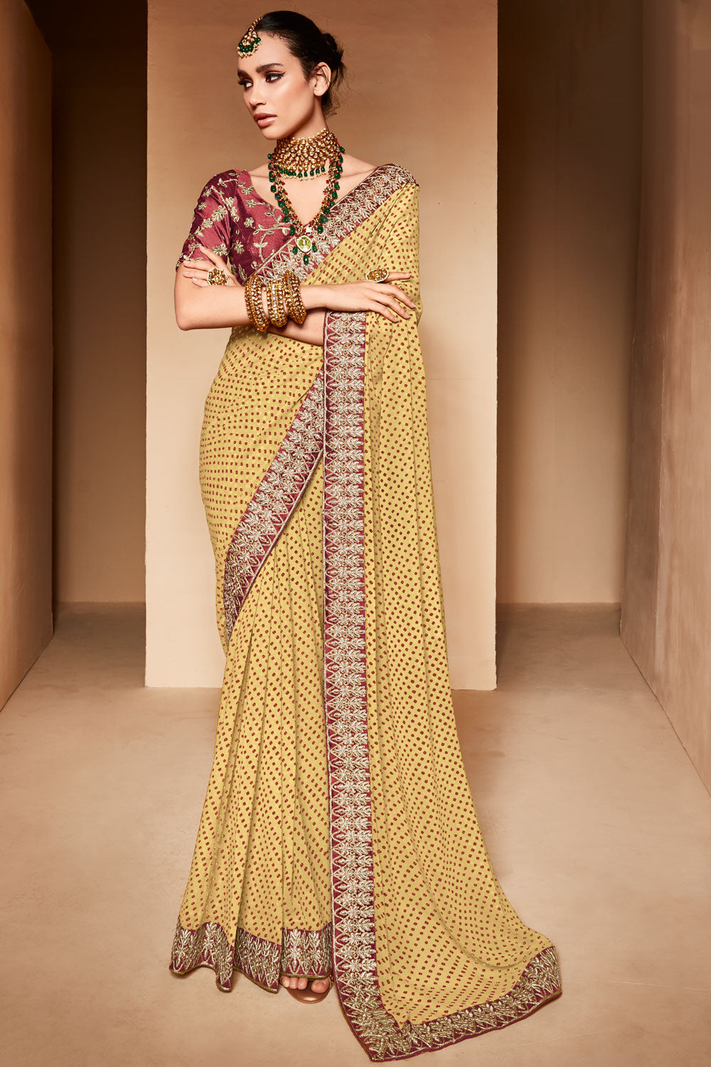 Alluring Pastel Yellow Bandhani Saree With Designer Blouse