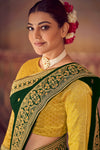 Dark Green Silk Embroidered Saree with yellow Blouse