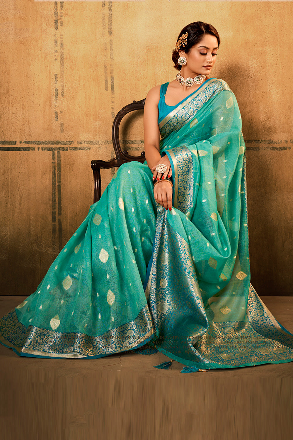 Sea Blue Tissue Silk Saree With Zari Weaving Work