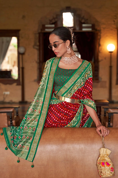 Stylish Red And Green Colour Soft Patola Saree With Hand Print