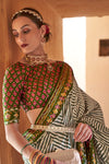 Stylish Fern Green Patola Silk Saree With Fancy Blouse