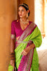 Charming Optic Green Woven Patola Silk Saree with Classic Border